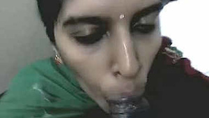 Desi Aunty Gives a Sensual Blowjob in the Office Toilet