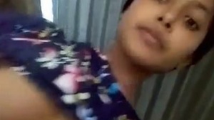Desi Indian girl her big tits and rubbing her wet pussy