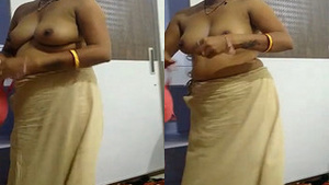 Sexy Bhabhi Shows Off Her Clothes in HD Video