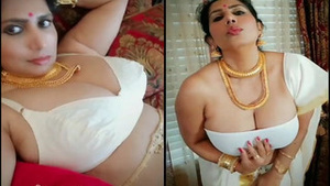 Busty Desi Auntie Shows Off Her Big Damn Tits in Exclusive Video