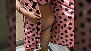 Nita, the swinger couples newbie, shows off her dancing skills in a bikini