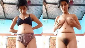 A new video features a cute and hairy woman pleasuring herself