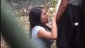 Hot college girl caught sucking big dick in the park