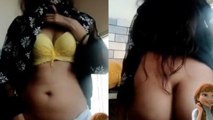 A tall girl flaunts her body in a steamy video