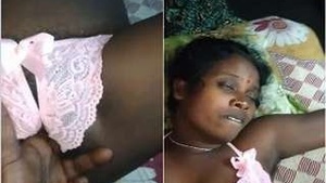 Exclusive Desi wife from the village gets off with her fingers and pussy licking