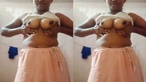 Indian Bhabhi Teases with Her Nude Body and Bathes