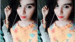 Desi girl with big tits teases her lover in this steamy video