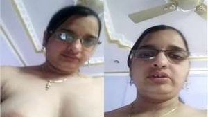 Exclusive Video of a Horny Woman Displaying Her Breasts