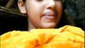 Beautiful Indian Girl Teases with Her Breasts and Genitalia