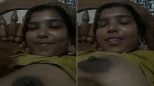 Exclusive video of a sexy Bhabhi with big tits on camera