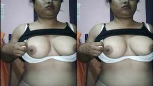 Exclusive video of a Desi Indian girl flaunting her breasts and pussy