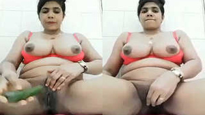 Amateur bhabhi enjoys cucumber masturbation in porn video