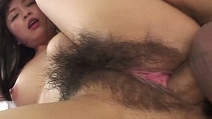 Japanese slut Nozomi Hazuki gets her hairy pussy drilled