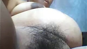 sexy pregnant asian piñata pushing her belly