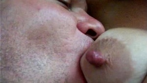 Sucking a huge nipple.