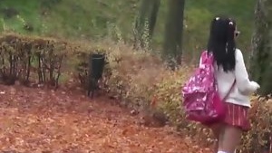 Cute schoolgirl, provoking in the streets, out in the open.