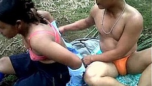 Baste and helpers of the Indonesian palm plantation