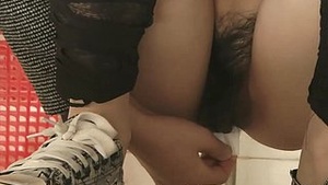 Chinese girls devote themselves not far from the toilet.