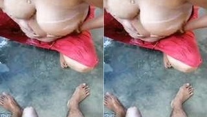 Desi Bhabhi bathing and Handjob