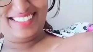 Swati naidu pressed against her chest