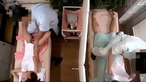 Japanese cheating wife during sex on massage next to husband