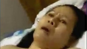 Horny Thai mom with round huge natural tits masturbating