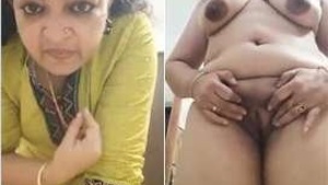 Horny Mallu Aunty Showing her big Boobs and Pussy