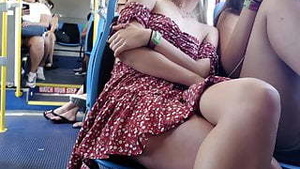 Amazing blonde showing her legs and enhancers; panties 1