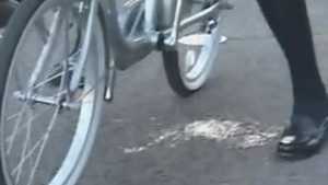 Schoolgirl injects on her bike from the public!