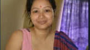 Desi woman with big tits pressing and husband Cum in her face