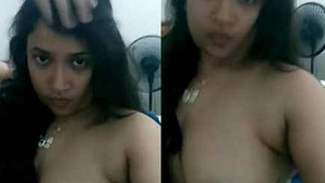 Cute indian College Girl Showing Her Breasts In Cal Video