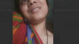 Bhabhi masturbating and talking on the phone