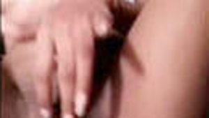 Beautiful girl rubs her pussy fingered