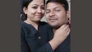 Sexy couple kissing in the office