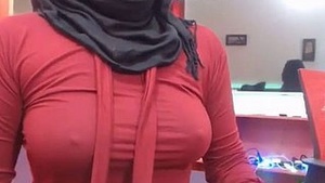 Surprised Muslim hijabi breasts wont hear the webcam