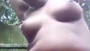 Mature Village bhabhi outdoor bath