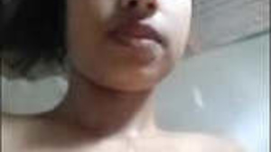 Beautiful girl showing breasts and pussy