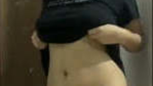 Beautiful girl showing breasts and pussy