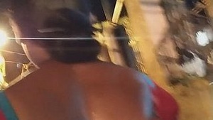 Indian lady in tit for tat with sweat almost adding backless sari