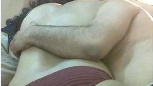 Indian house wife playing with her friend while he records