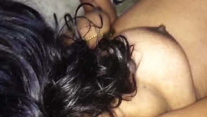 Husband playing with breasts