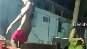 Naked Suraika performers dancing to a tractor soundtrack