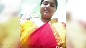 Beautiful Indian woman shows her big breast and opens her vagina in front of the camera.
