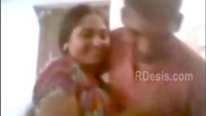 Married woman’s perfunctory sex with the neighbor's son in a Indian film