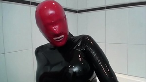Latex outfit in a hot scene.