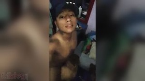 A young Indian man has sex with his married neighbors’ wife on a cradle.