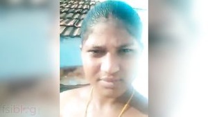 Telugu auntie shows off her sexy body in clothes.