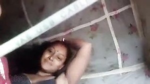 Secretly, a Bengali wife makes love to her secret lover via IMO video calls.