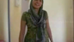 A housewife from Hoshiarpur, Punjab undresses.