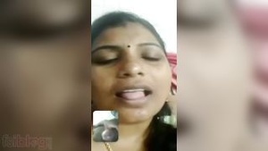 Tamil wife having phone sex with her boyfriend through WhatsApp MMS in a movie scene